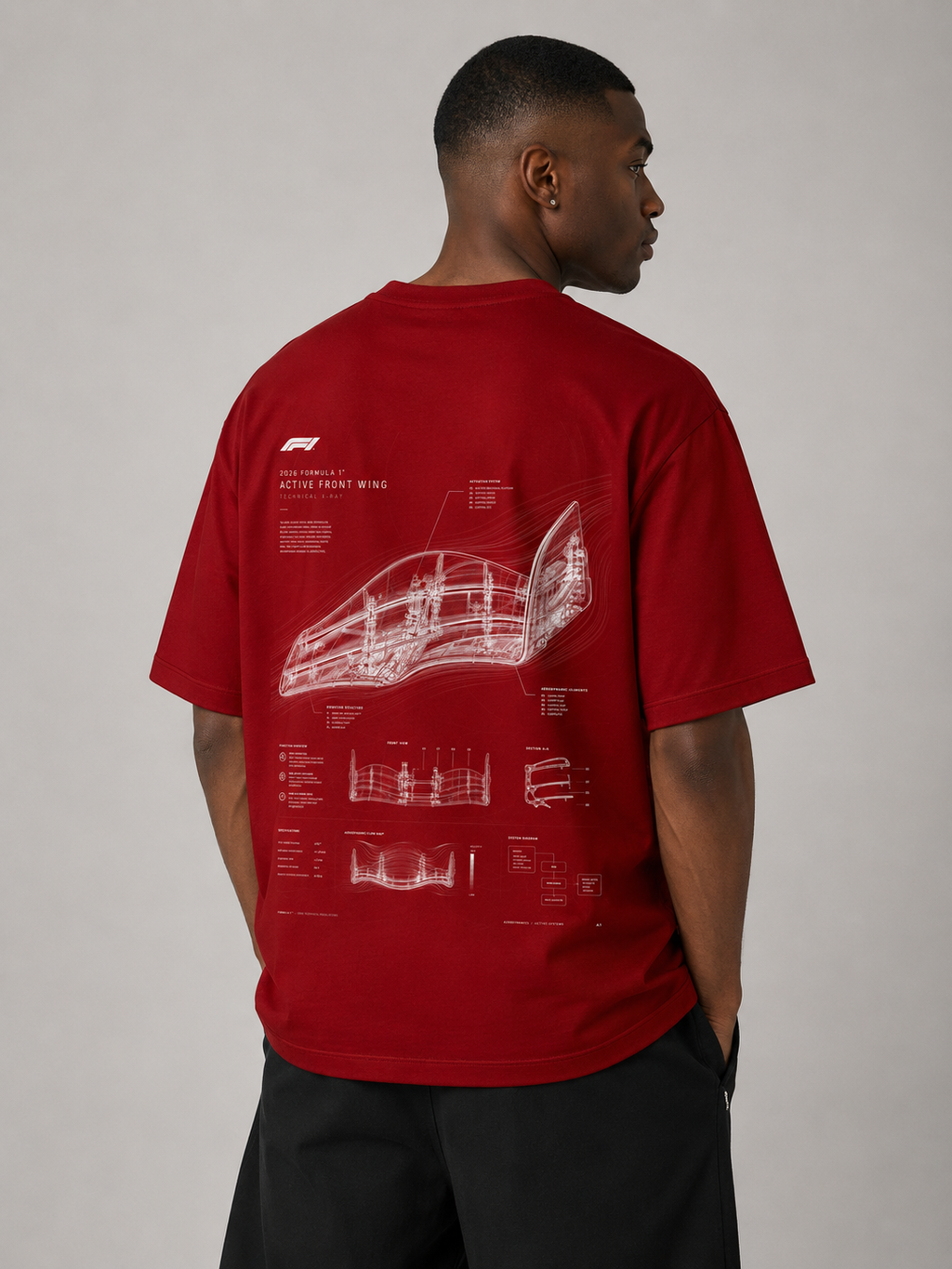 Person wearing a red t-shirt with a white graphic design on the back against a plain background